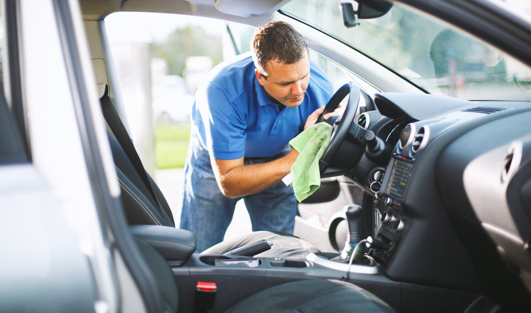 A man washing his car