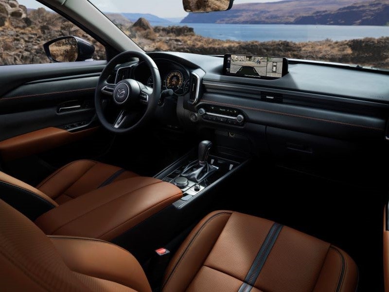 Sales team helping customers at dealership