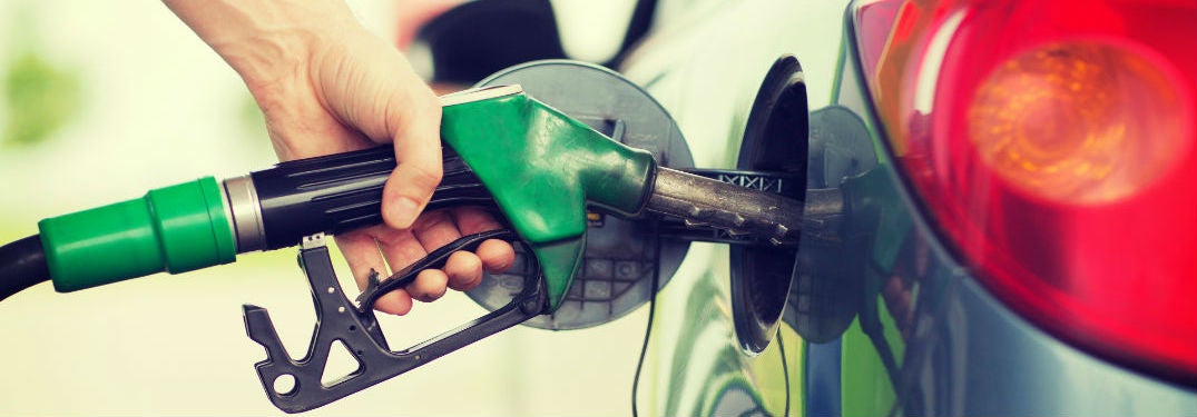 Man pumping gas