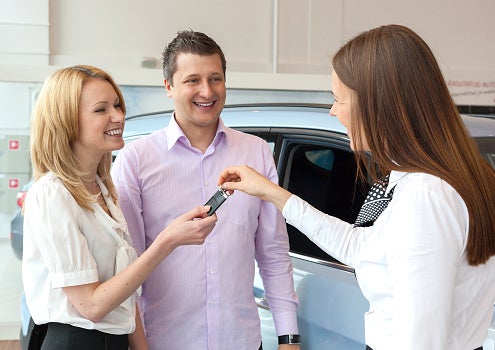 Couple leasing a car