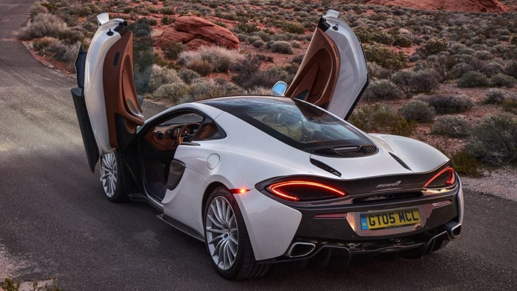 mclaren-570gt-white-for-sale-rear-3quarter-doors-up-grid-content