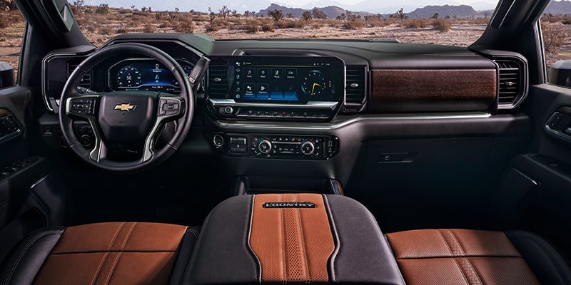 Interior of a 2024 Chevy Silverado HD pickup truck. - Ted Britt Chevrolet Sterling, VA