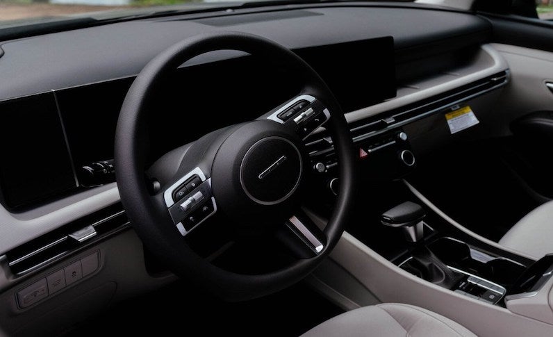 The Hyundai Tucson features an elegant, minimalistic interior design and multiple dynamic engine options for a smooth ride.