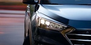 Close view of the front passenger side of a blue 2020 Hyundai Tucson. | Hyundai dealer in Little Rock, AR.