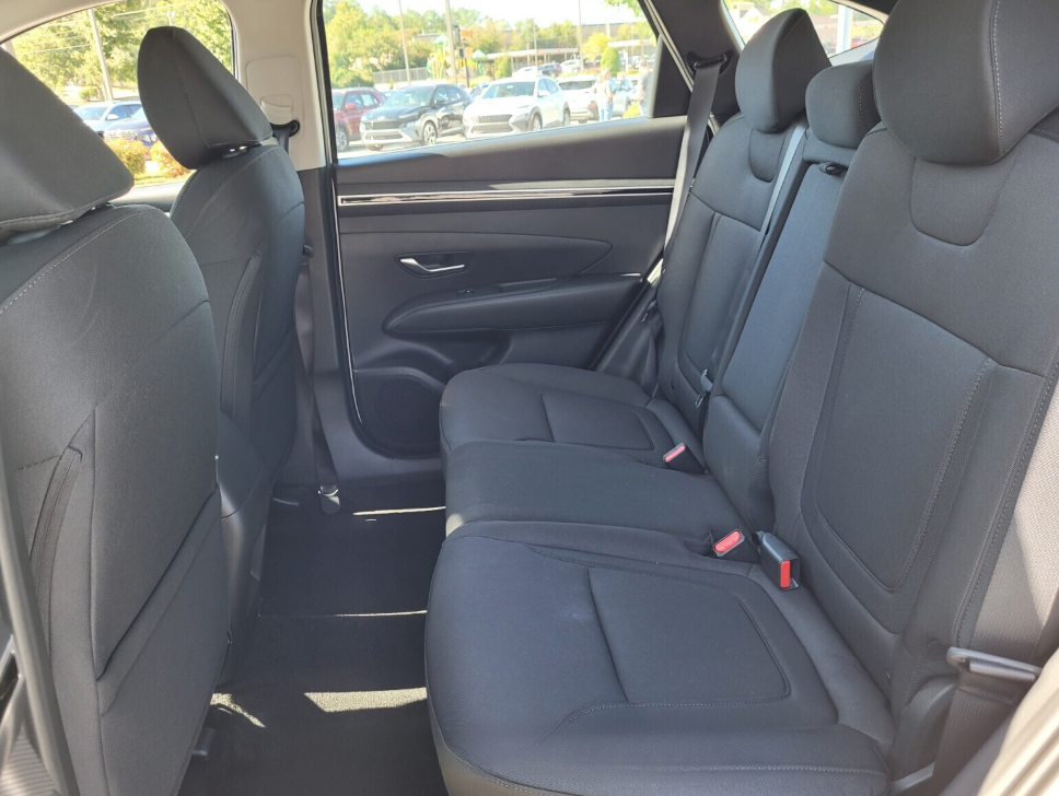 Spacious rear seats in a Hyundai SUV with black cloth interior