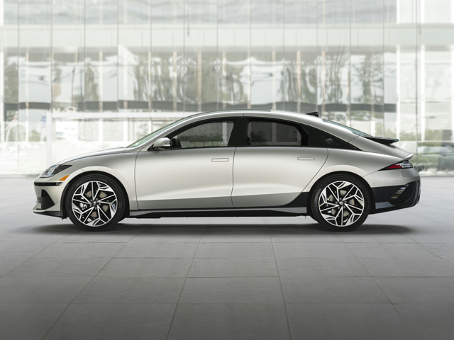 Profile view of a white 2023 Hyundai IONIQ 6. | Hyundai dealer in Little Rock, AR | Crain Hyundai of Little Rock