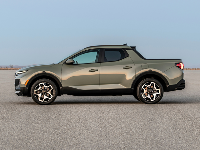 Profile view of a parked, gray 2023 Hyundai Santa Cruz. | Hyundai service in Little Rock, AR.