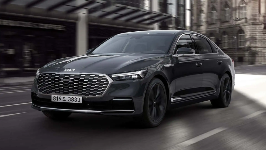 black luxury car driving on a city road