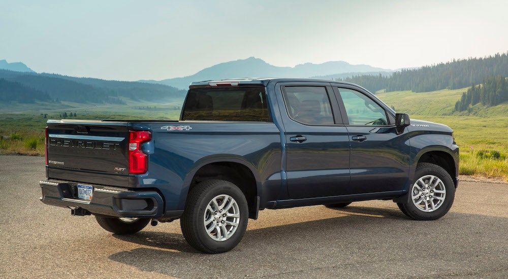 A parked blue 2025 Chevy Silverado 1500 RST.