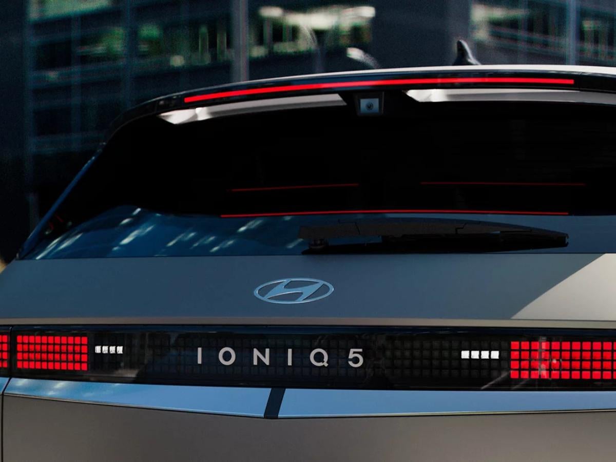 Rear view of the Hyundai IONIQ 5 electric SUV showing its modern pixel-style taillights and sleek design, named a 2026 Top EV Pick by Cars.com.
