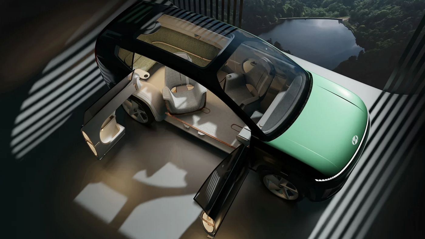 Overhead view of Hyundai's futuristic Ioniq EV SUV concept with open doors and panoramic glass roof