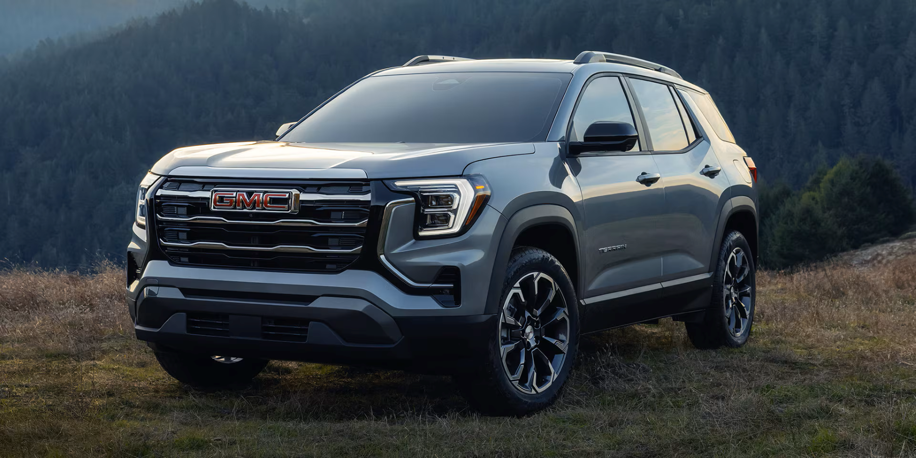 2026 GMC Terrain posed on a mountainside
