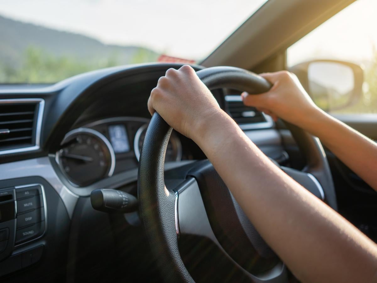 Driver hands on the steering wheel during a Hyundai test drive in Fayetteville, AR