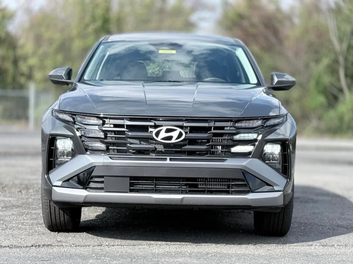 Front view of a charcoal gray 2026 Hyundai Tucson Hybrid at Crain Hyundai of Fayetteville.