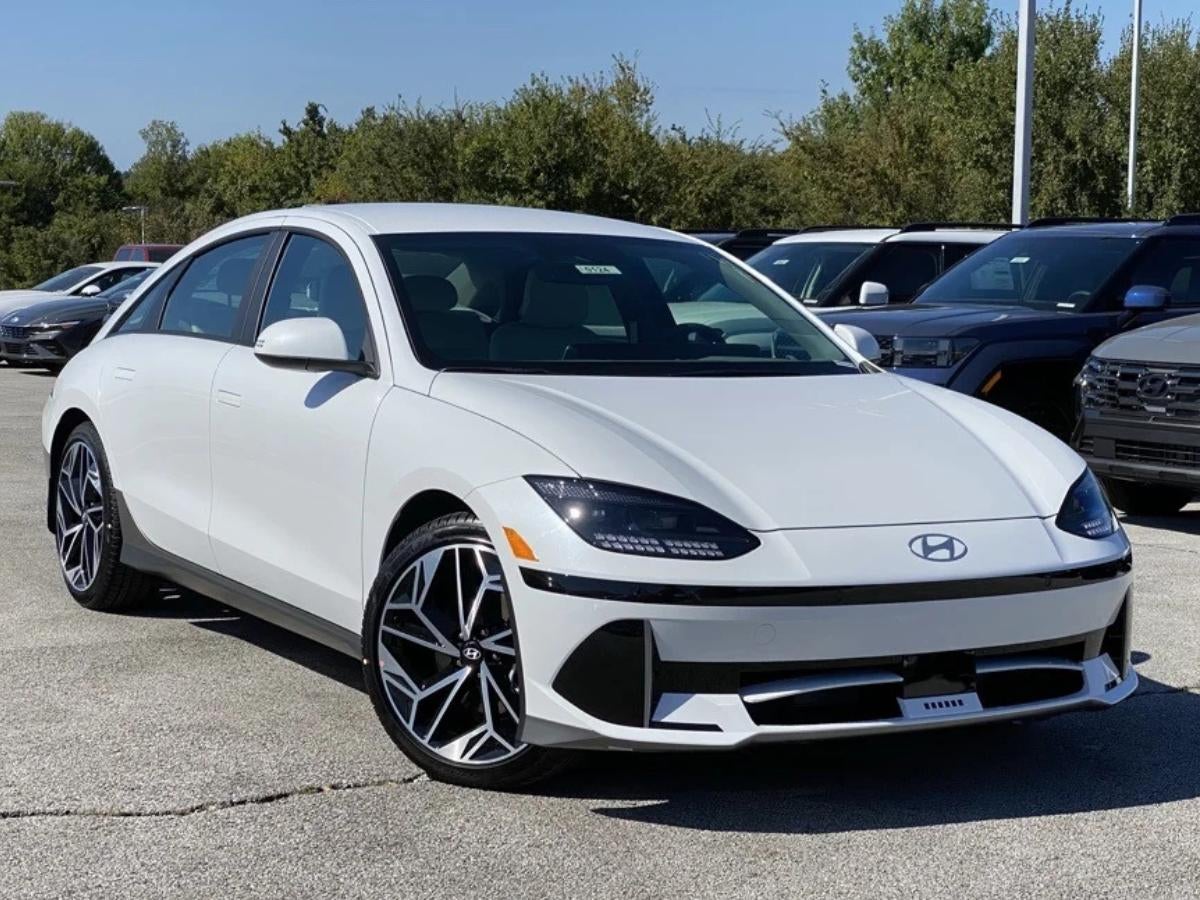 White Hyundai IONIQ 6 electric sedan parked at Crain Hyundai of Fayetteville dealership lot