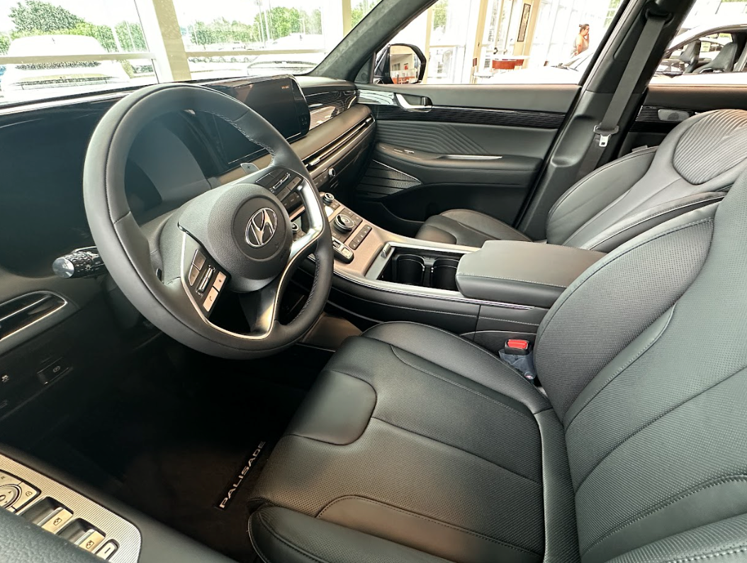 Modern Hyundai vehicle interior featuring advanced technology and push-button start