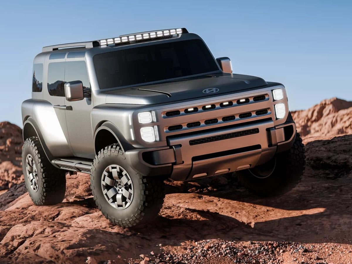 Hyundai Boulder concept SUV off-road on rocky terrain near Fayetteville AR showing rugged design and large tires