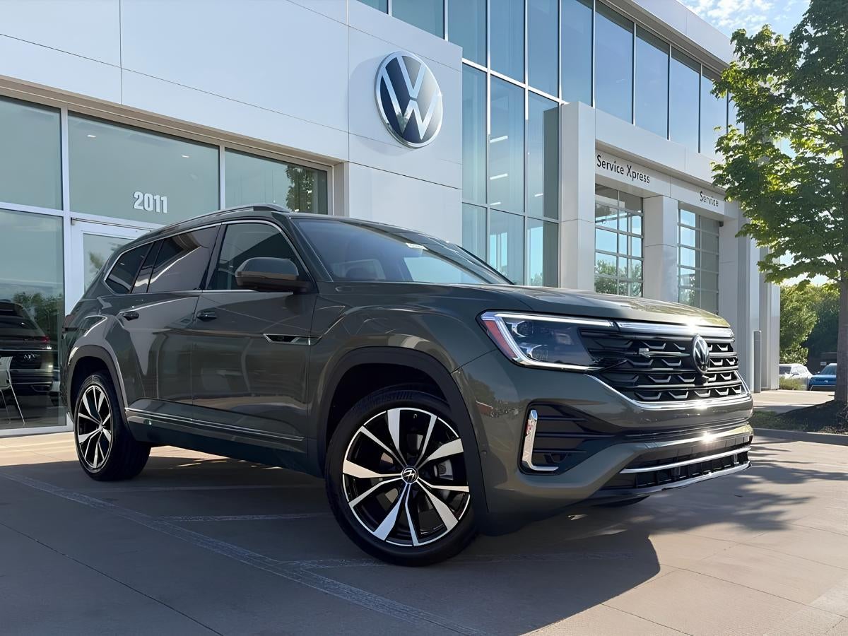 Volkswagen Atlas in Fayetteville, AR parked at Crain Volkswagen dealership with three row SUV design