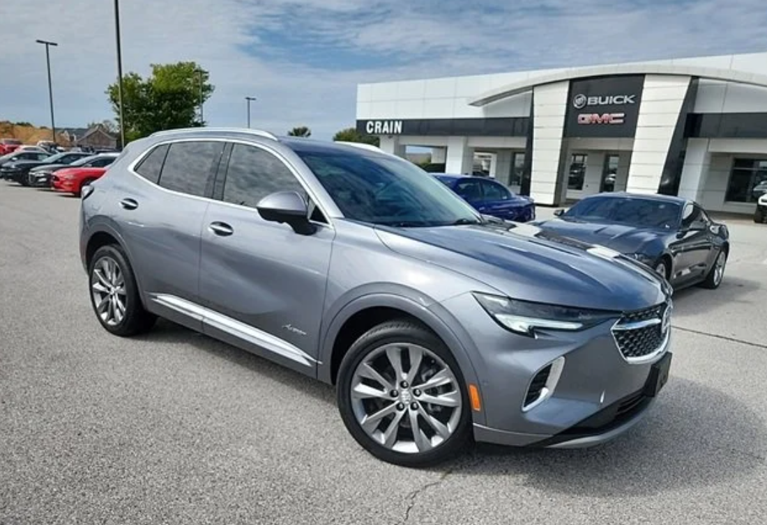 Silver Certified Pre-Owned Buick Envision parked at Crain Buick GMC in Springdale