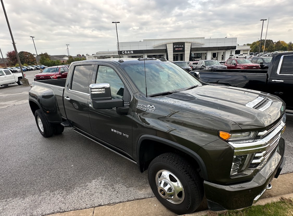 GMC Sierra 3500 HD High Country parked outside Crain Buick GMC in Springdale, Arkansas