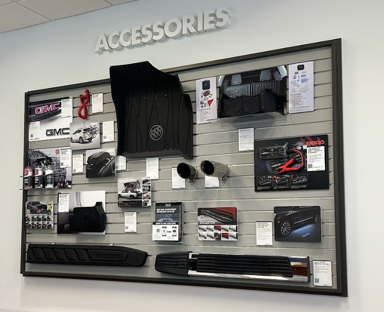 Wall display of official Buick and GMC accessories at Crain Buick GMC in Springdale, Arkansas