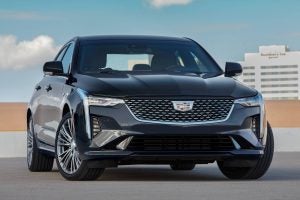 A black 2022 Cadillac CT4 Sedan.