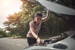 Checking Under Hood of Car Maryland