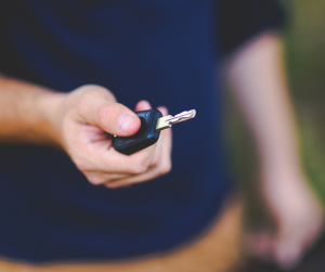 Man holding car key | Lanham, MD