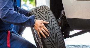 Man Changing Tire | Lanham, MD