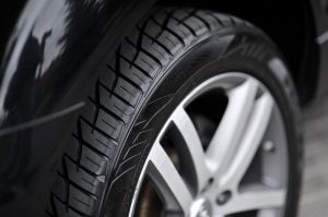 Up Close of Car's Tire on Road
