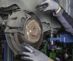 Mechanic Fixing the Brake Disc | Bowie, MD