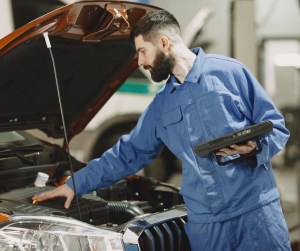 Man looking under Car hood | Bowie, MD