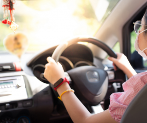 Teenage girl driving car wearing a mask | Frederick, MD