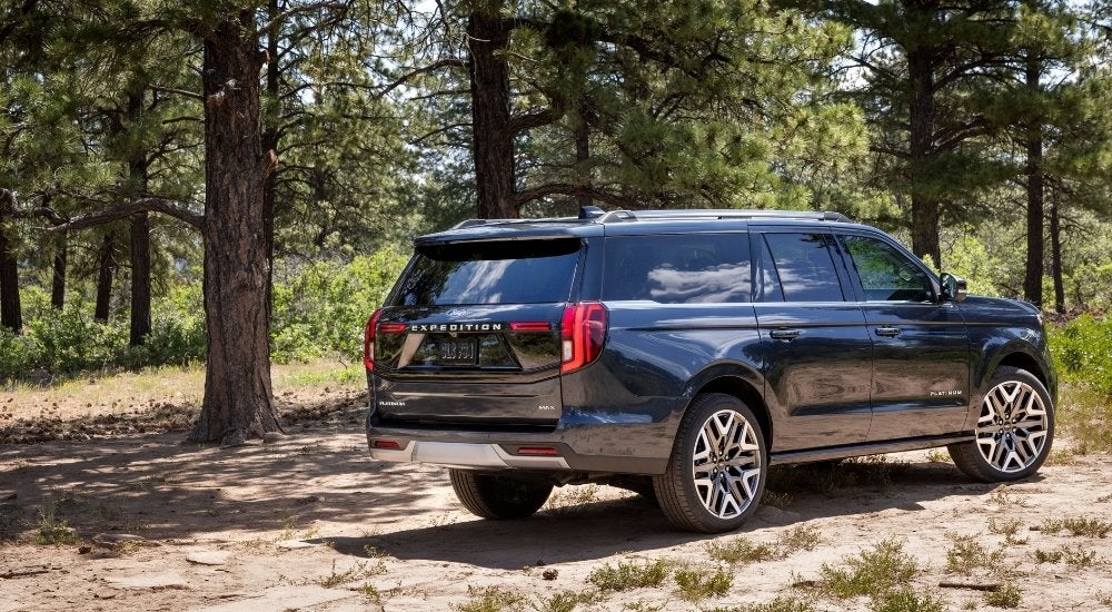 A grey 2024 Ford Expedition from the side.