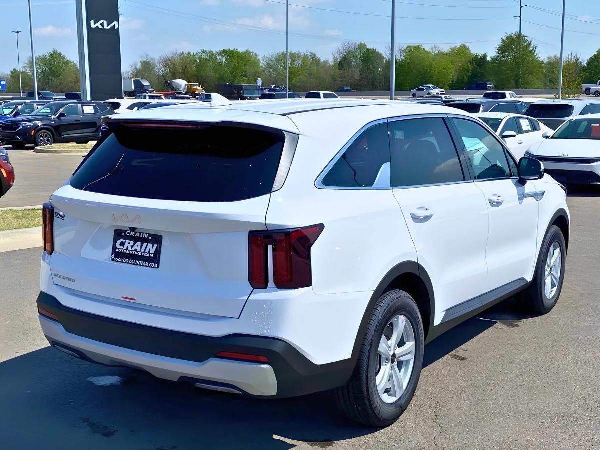 Kia Sorento in Fort Smith AR parked at Crain Kia of Fort Smith dealership showing rear three row family SUV design