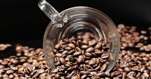 Coffee mug and coffee beans | Performance Group Columbus in Dublin, OH