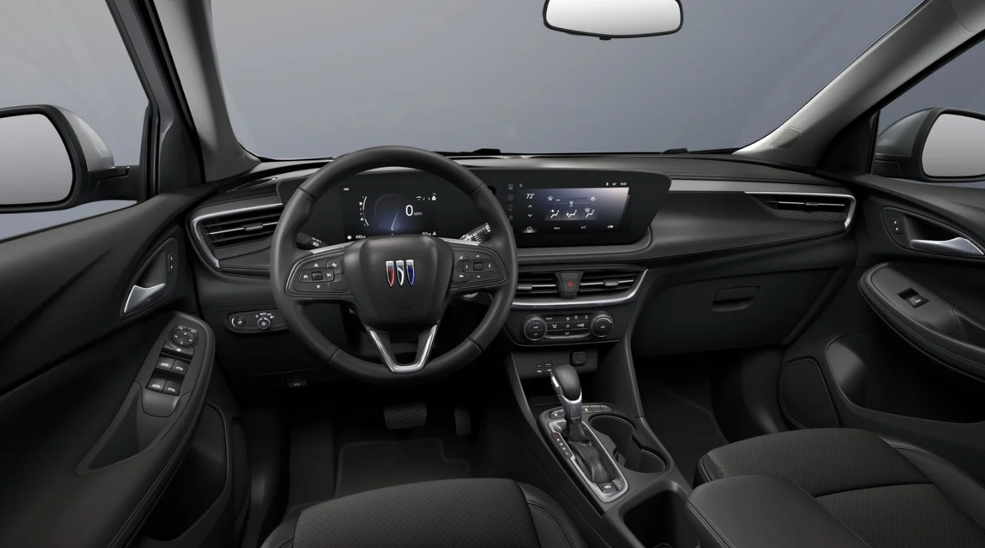 Interior view of a modern Buick dashboard and steering wheel showcasing driver assistance and digital safety features