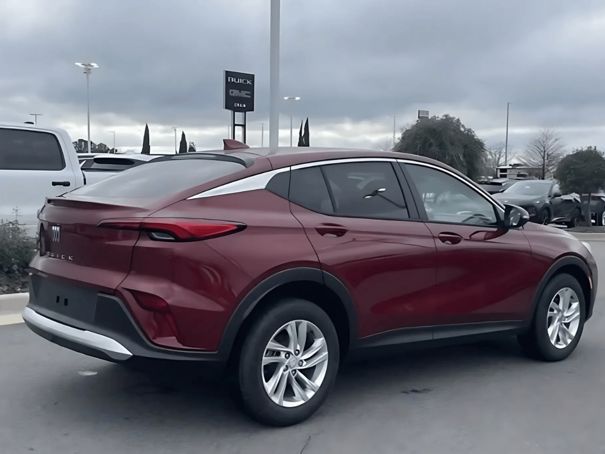 Rear and side view of the 2025 Buick Envista in red parked at Crain Buick GMC in Conway, Arkansas