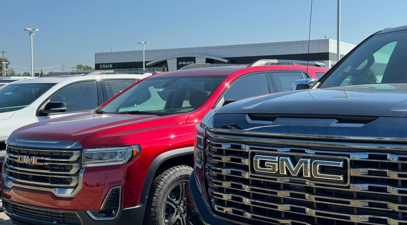 New GMC SUVs parked outside Crain Buick GMC in Conway, Arkansas