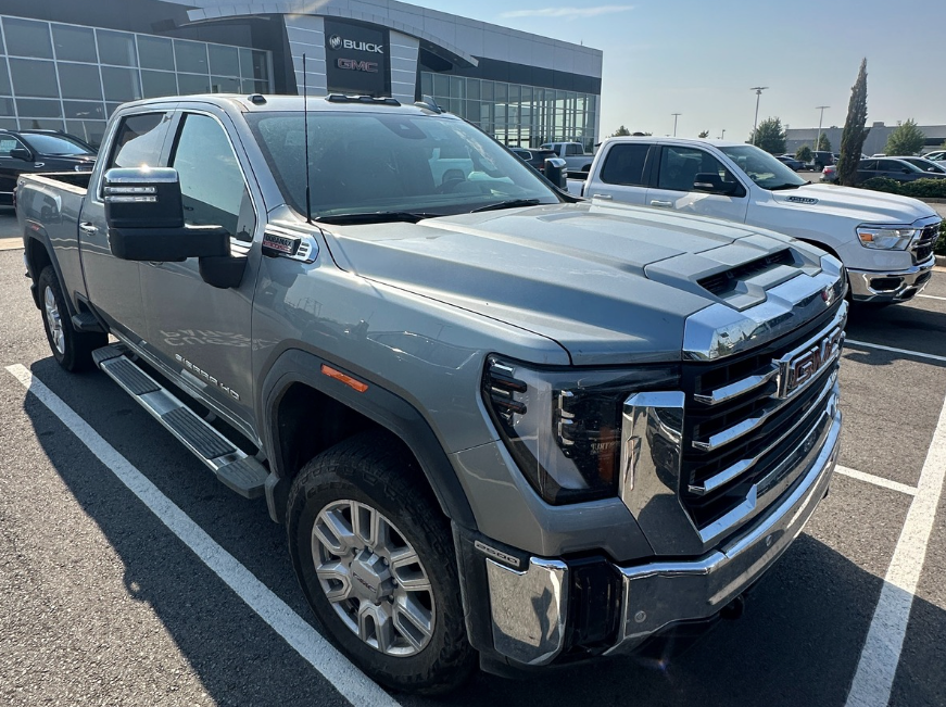 Front-side view of a GMC Sierra HD pickup with Pro Safety Plus parked at Crain Buick GMC in Conway, Arkansas