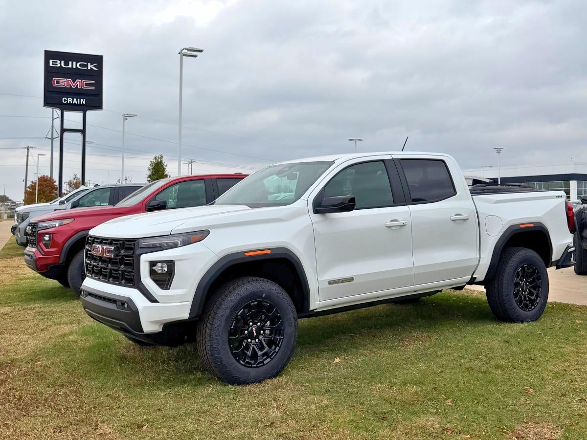 GMC trucks displayed on the lot at Crain Buick GMC in Conway, Arkansas.