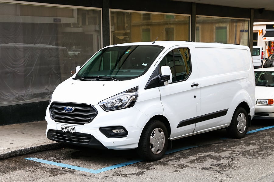 Ford Transit cargo van in the city street.