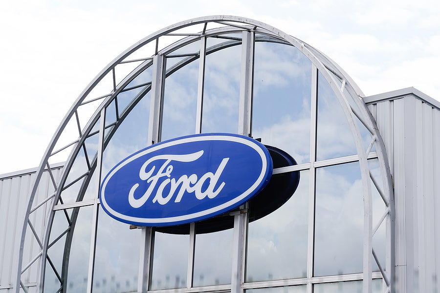 Ford logo store sign on entrance of dealership