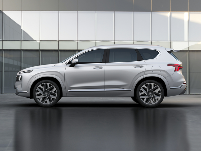 Side view of a 2023 Hyundai Santa Fe in front of a modern building