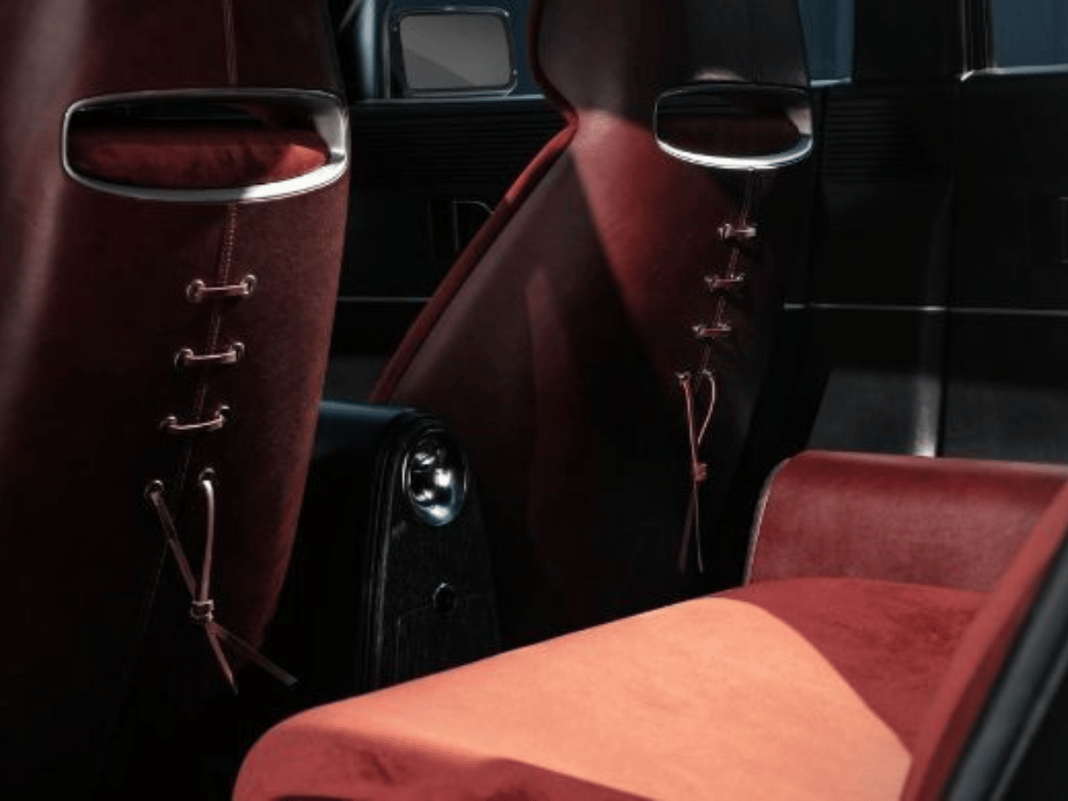 Close-up of thFuturistic interior seating of the Hyundai Azera concept car, highlighting bold red and burgundy upholstery with modern design accents.e premium red and burgundy rear seat design in a used Hyundai Azera, emphasizing the model’s luxury features available at Crain Hyundai of North Little Rock.**