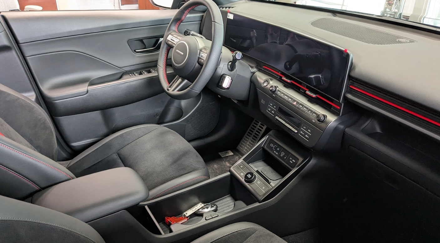 Interior view of a modern Hyundai showcasing a sleek dashboard and digital instrument panel