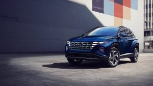 A parked blue 2022 Hyundai Tucson Hybrid. | Hyundai dealer in Fort Smith, AR.