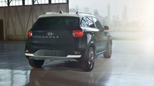 Rear view of a parked, dark blue 2022 Hyundai Venue. | Hyundai dealer in Fort Smith, AR.