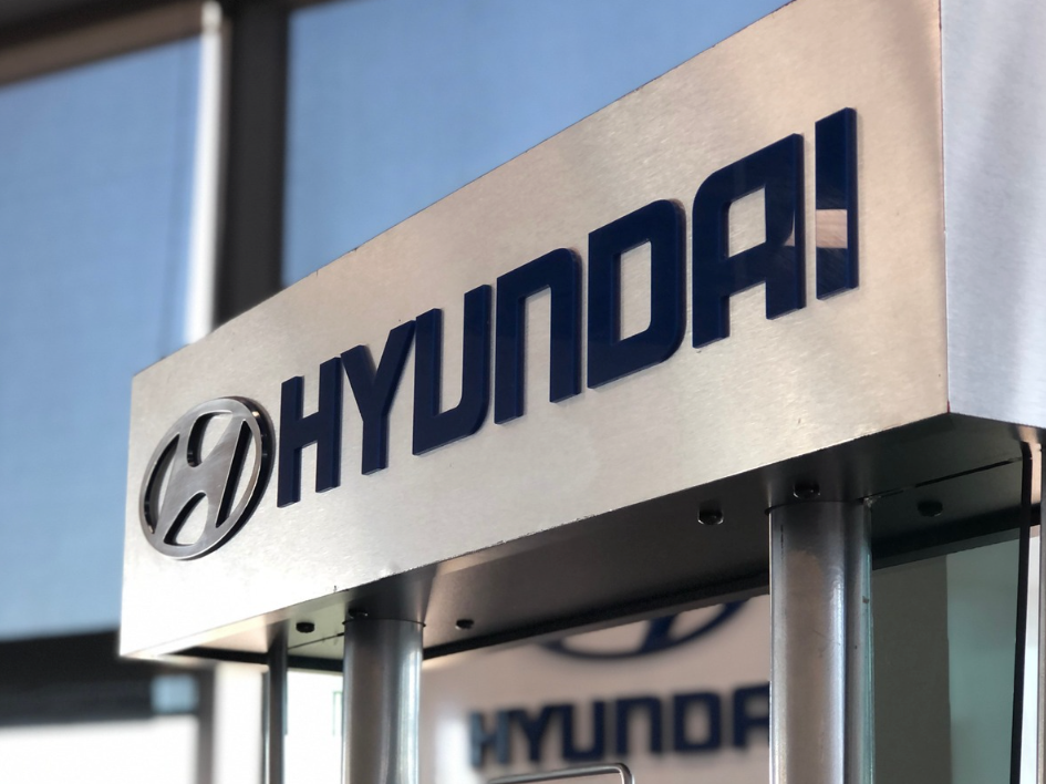Close-up of the Hyundai dealership sign inside Crain Hyundai of Fort Smith, symbolizing trusted auto financing solutions in Arkansas.