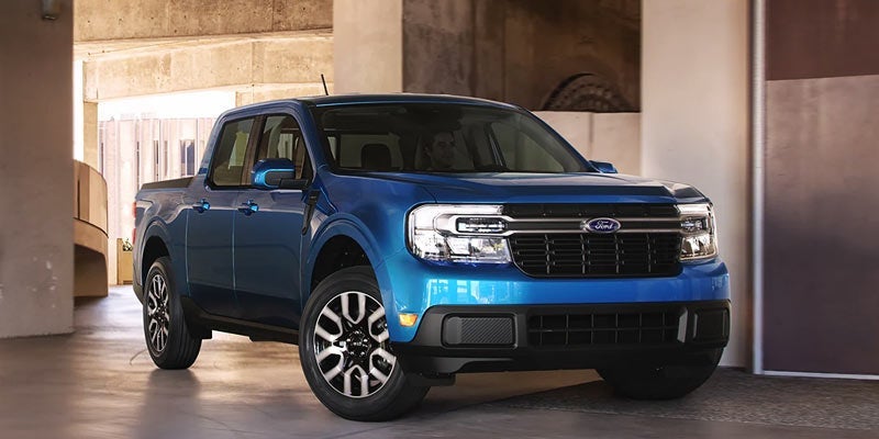 A parked royal blue 2022 Ford Maverick. | Ford dealer in Jacksonville, AR.